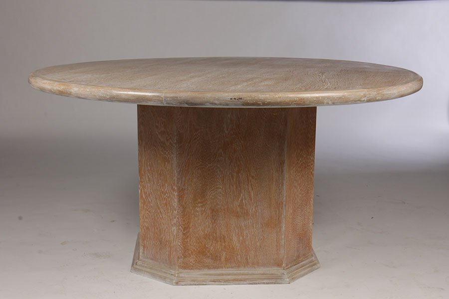 LARGE MID CENTURY MODERN OAK DINING TABLE C.1970: A large mid Century modern cerused oak dining table having banded top supported on octagonal pedestal with stepped base circa 1970. Ht: 30" Dia: 60"