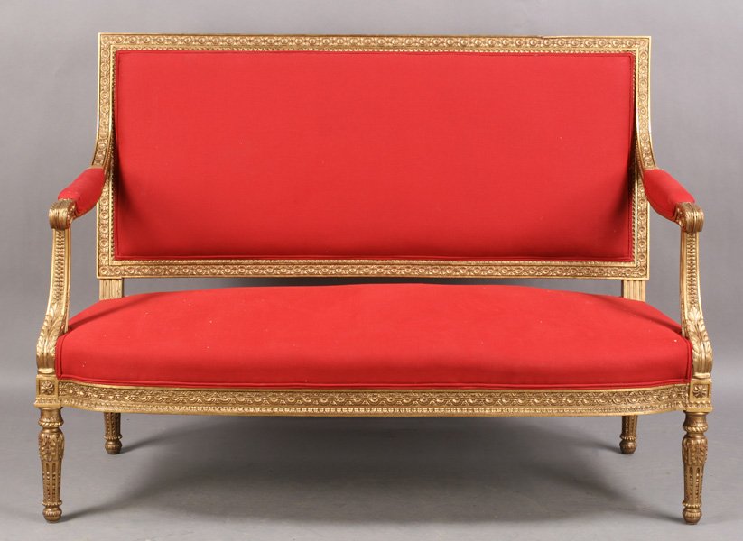 LOUIS XVI GILTWOOD OPEN ARM SETTEE CIRCA 1920: Louis XVI style giltwood open arm settee with having nicely carved frame, resting on carved and fluted legs circa 1920. Ht: 40" Width: 52" Depth: 30"
