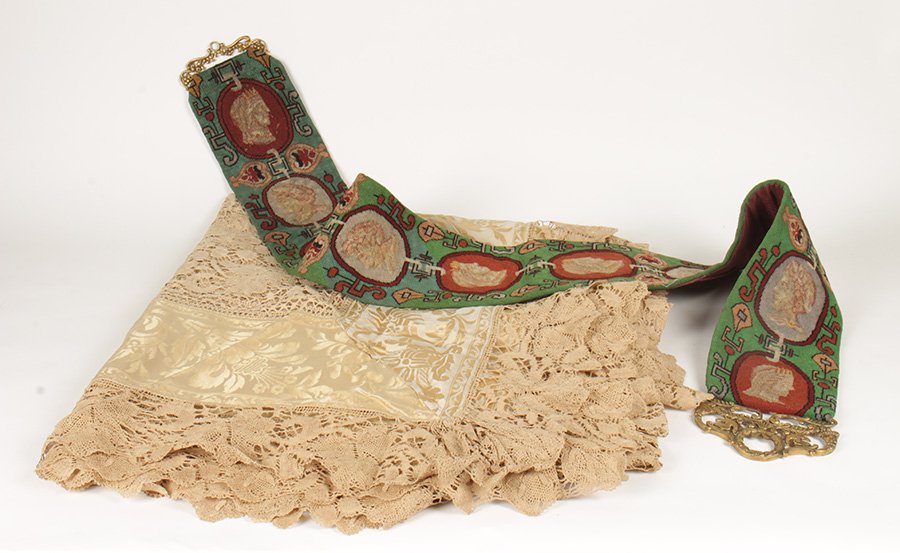 2 PC TEXTILE LOT C.1900 BELL PULL & TABLECLOTH: Two piece textile lot consisting of a petit-point Adam style bell pull (60" x 52") and a lace and silk Damask table cloth (92" x 82") circa 1900.