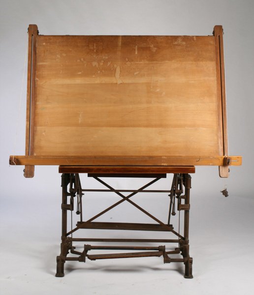 LABELED FRENCH JACQUE NASSER DRAFTING TABLE 1910: Labeled French Jacques Nasser, Liege mechanical drafting table having wood top and adjustable counter balanced iron base circa 1910. Ht: 43" Width: 59.5" Depth: 48"