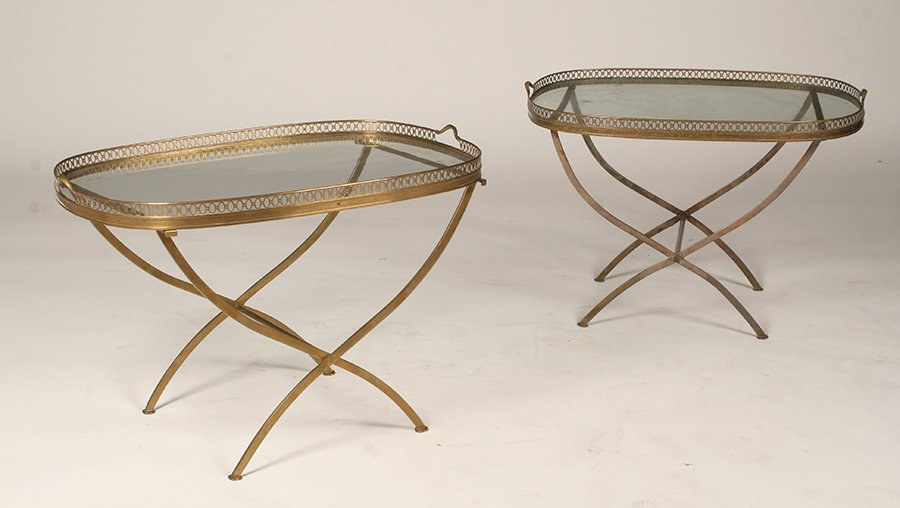 PAIR OF REGENCY STYLE BRONZE FOLDING TRAY TABLES c1950: A pair of Regency style bronze folding tray tables having galleried glass tray tops supported on X-form base. C 1950 Ht: 21" Width: 30.5" Depth: 22"