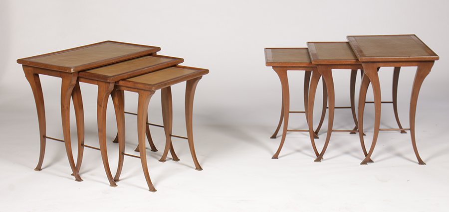 2 SETS OF 3 MAHOGANY NESTING TABLES C. 1940: Two sets of three mahogany nesting tables having leather embossed tops over downswept legs circa 1940. Ht: 21.75" Width: 24" Depth: 14.5"