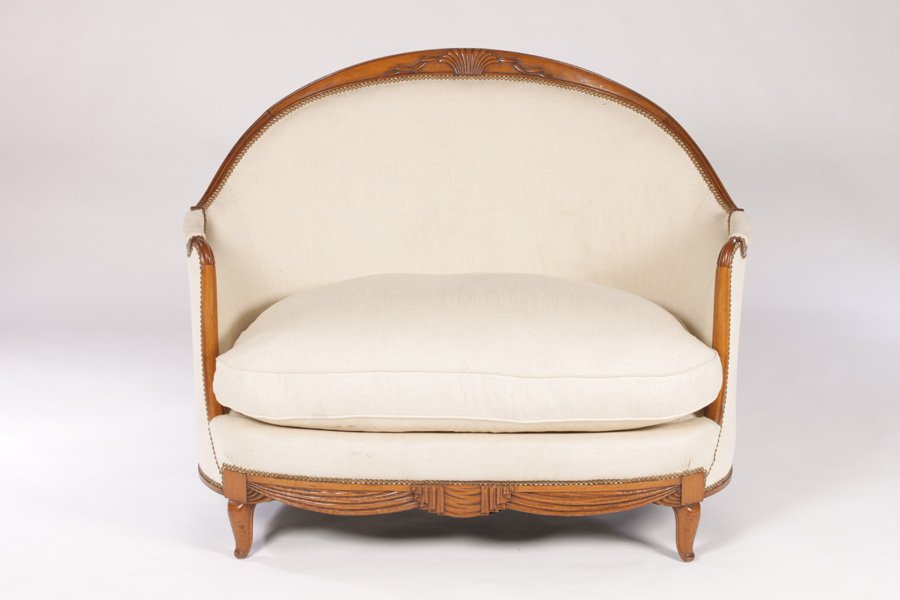 UNUSUAL ART DECO CARVED SETTEE: A good and unusual Art Deco carved settee circa 1930. Ht: 39" Width: 50" Depth:36"
