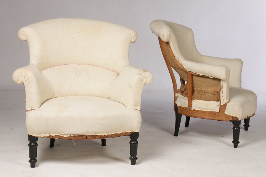 PR NAP. III BERGERE CHAIRS ROLLED ARMS: A pair Napoleon III bergeres having arched and flared back over rolled arms raised on turned legs circa 1880. Ht: 32" Width: 32" Depth: 19"