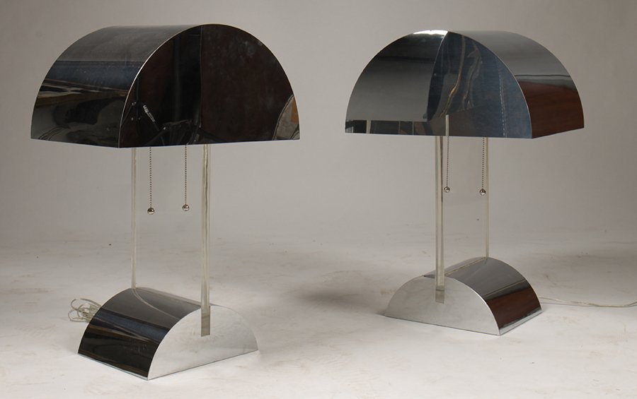 PAIR OF MID CENTURY GEORGE KOVACS LUCITE TABLE LAMPS: A substantial pair of George Kovacs mid century modern lucite table lamps having chrome shades and a chrome base circa 1970. Ht: 24" Width: 16" Depth: 10"