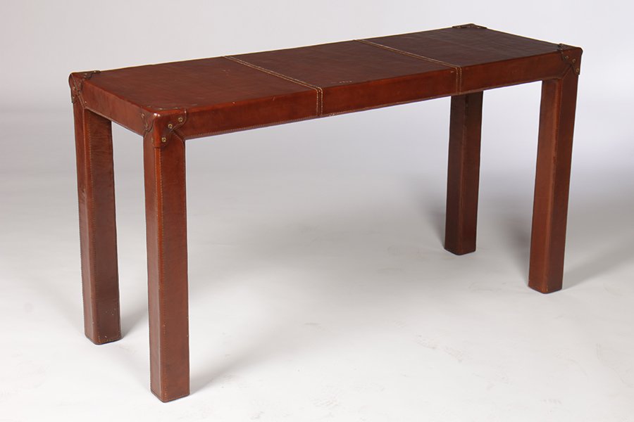 RALPH LAUREN LEATHER COVERED CONSOLE: A stylish Ralph Lauren leather covered console having capped corners and bridle stitched seams. Ht: 31.5" Width: 57" Depth: 20"
