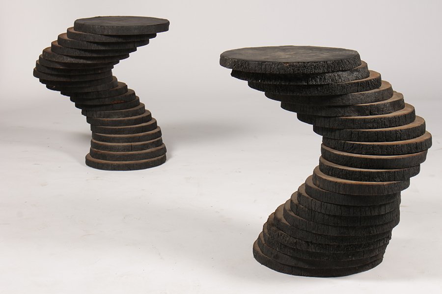PAIR 20TH C. STACKED CURVING WOOD SIDE TABLES: A pair of twentieth century studio made stacked and curving wood side tables. Ht: 25"