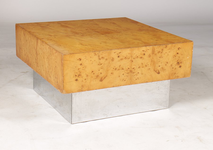 MILO BAUGHMAN STYLE WALNUT COFFEE TABLE: A Milo Baughman style walnut coffee table having rectangular top and metal clad plinth base. Ht: 16" Width: 30" Depth: 30"