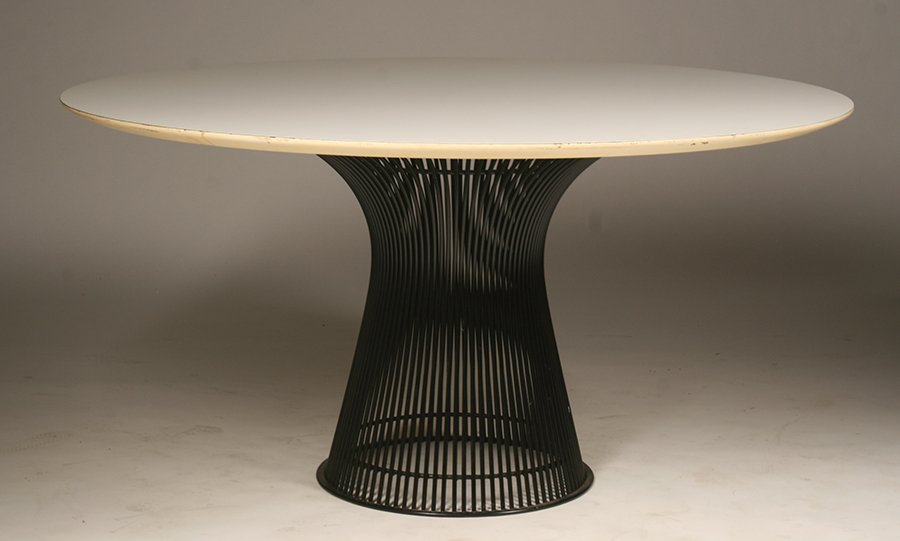 WARREN PLATNER FOR KNOLL DINING TABLE C. 1970: A Warren Platner for Knoll dining table having white top supported on a wrought iron base circa 1970. Ht: 28.5" Dia: 54"