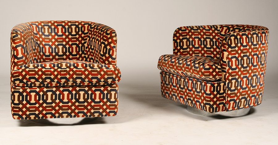 PR OF MILO BAUGHMAN CLUB CHAIRS C. 1970: A pair of Milo Baughman for Thayer Coggin upholstered barrel back club chairs raised on chrome swivel base circa 1970. The fabric is possibly Jack Lenor Larsen. Ht: 27" Width: 28" Depth: 24"