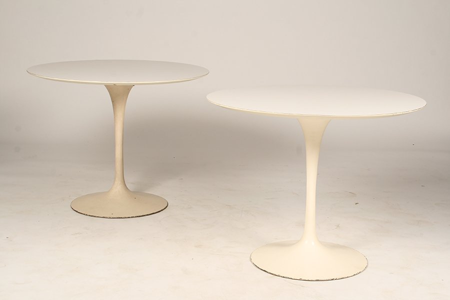 PR OF KNOLL EERO SAARINEN TULIP TABLES C. 1960: A pair of labeled Knoll Eero Saarinen tulip tables having composite white top supported on metal base circa 1960. Ht: 28.5" Dia: 36"
