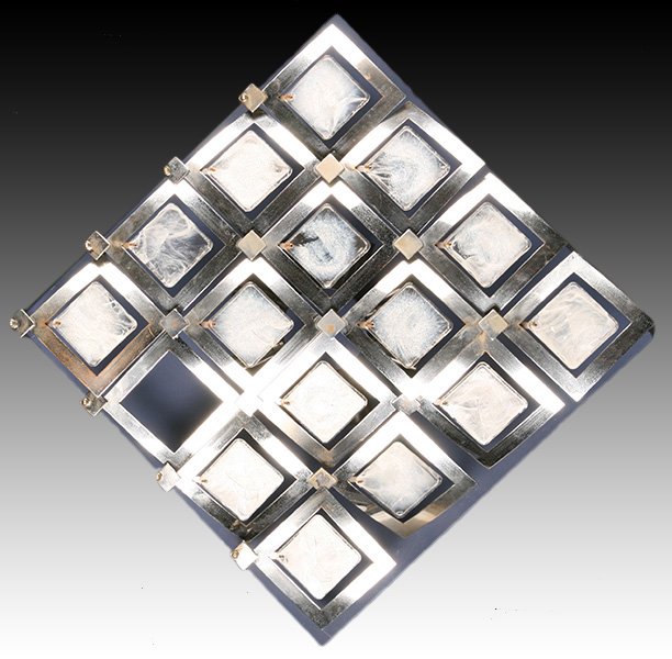 MID CENTURY CHROME OPALINE AND GLASS WALL SCONCE: An unusual mid century modern chrome and opaline glass wall sconce circa 1970. Ht: 17" Width: 17"