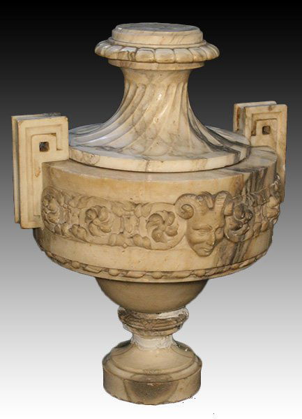 ALABASTER URN WITH CENTRAL FRIEZE CIRCA 1900: A very good alabaster urn having satyr, foliate, and roundel decorated central frieze and two raised handles circa 1900. Ht: 21" Width: 15.5"