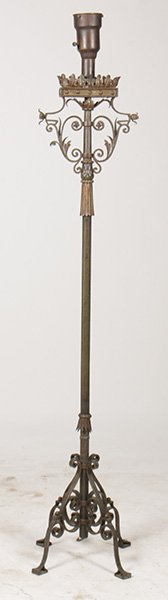 WROUGHT IRON FLOOR LAMP TOLE SCROLL: A very good wrought iron floor lamp having tole scroll and leaf decorated top sections and scrolling base circa 1920. Ht: 62"