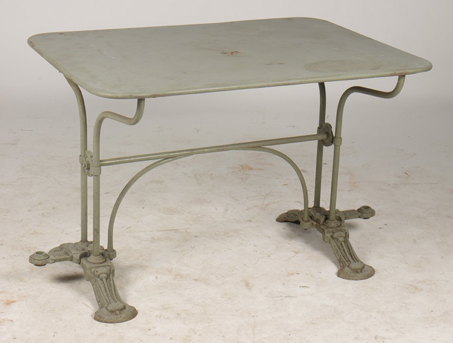 LABELED FRENCH CAST IRON GARDEN TABLE METAL TOP: A very good labeled French 'E.W. Paris' cast iron garden table having metal top circa 1910. Supported by wrought and cast iron base with cross stretcher. Provenance: a Mainline Philadelphia Estate. Ht