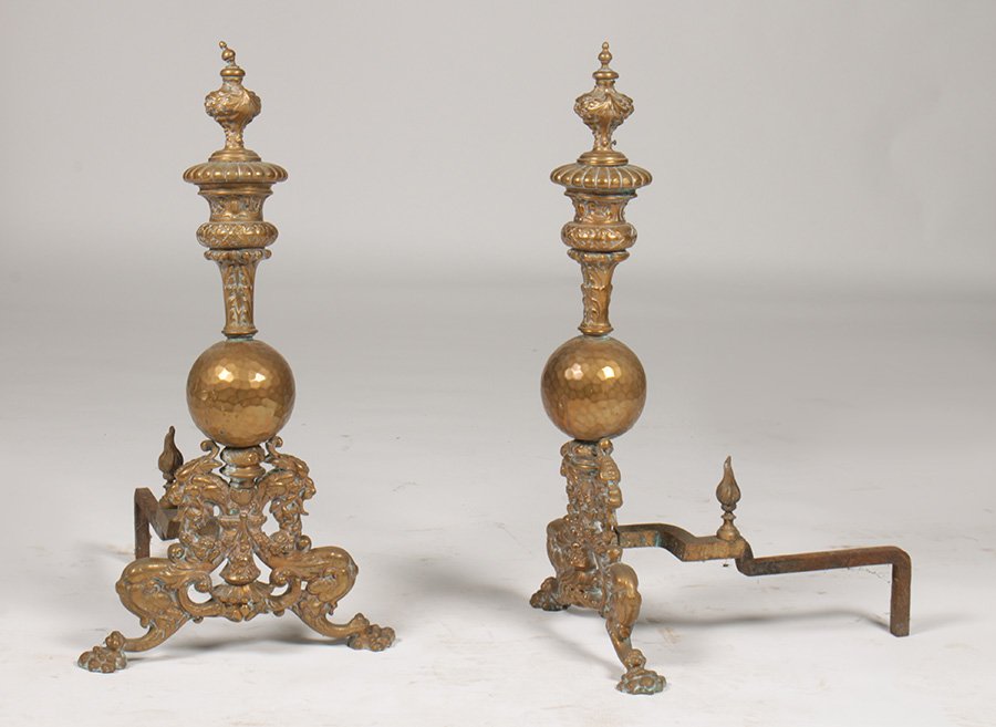 PR FRENCH REGENCY STYLE BRONZE ANDIRONS C. 1910: A pair of French Regency style bronze andirons having a hand-hammered sphere resting on paw feet circa 1910. Ht: 35" Width: 16"