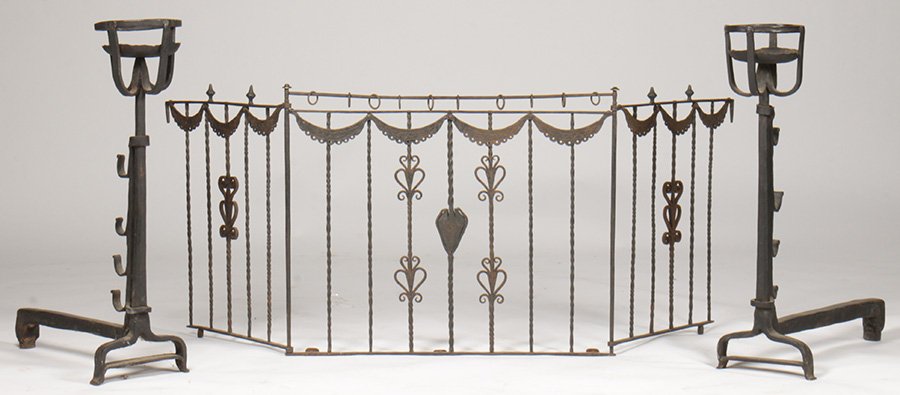 3 PIECE LOT FIREPLACE SCREEN WROUGHT ANDIRONS: A three piece lot of fireplace equipment circa 1920. Including a pair of Yellin style wrought iron andirons with peet baskets and a folding screen with draped garland and fruit decoration.` Ht: 31.5"