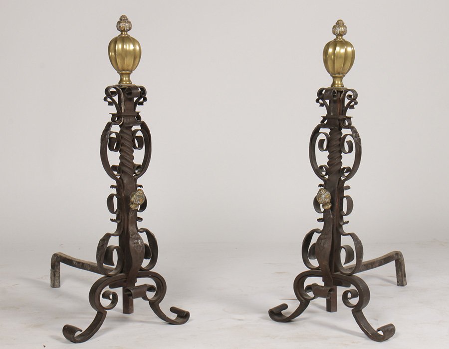 PR OF RENISSANCE STLYE WROUGHT IRON ANDIRONS: A good pair of late nineteenth Century Renaissance style Continental bronze and wrought iron andirons having figural and melon shaped finials. Finials are supported on twist and scroll decorated iron