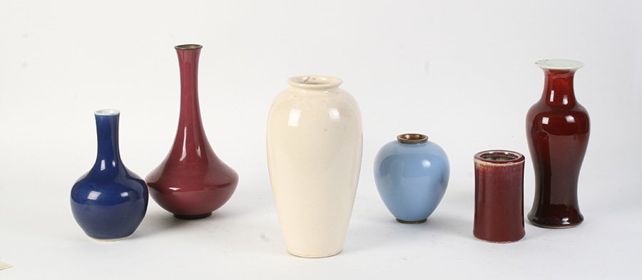 SIX ASIAN CASES PORCELAIN ENAMEL CIRCA 1940: A grouping of six Asian vases to include four porcelain vases and two enamel forms circa 1940. Ht: 8" Width: 4" Depth: 4" (white vase)