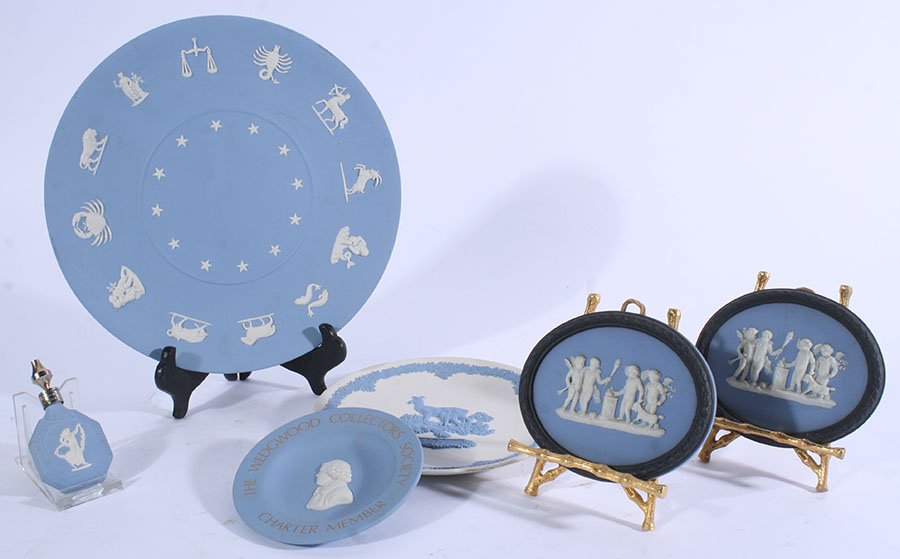 LOT OF 6 19TH-20TH C. WEDGWOOD JASPERWARE: A six piece lot of nineteenth to twentieth Century Wedgwood wares. Featuring two antique solid blue and white jasper plaques with basalt framing, a perfume vile, and three plates. Ht: 3.75" Width: 4.7