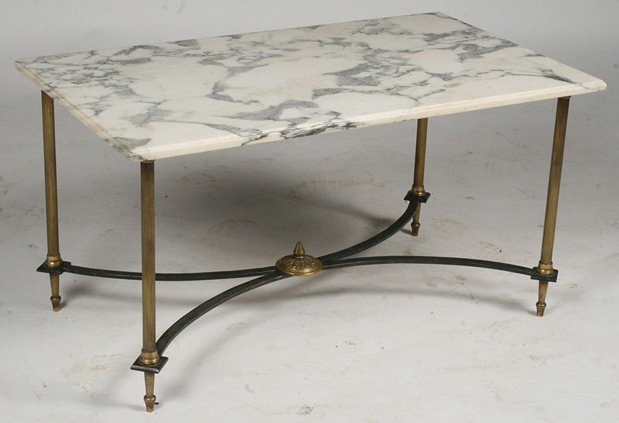 FRENCH BRONZE IRON COFFEE TABLE REEDED COLUMNS: A French bronze and iron coffee table having marble top supported on reeded columns with shaped stretcher and central bronze finial. Ht: 19.5" Width: 35" Depth: 19.5"