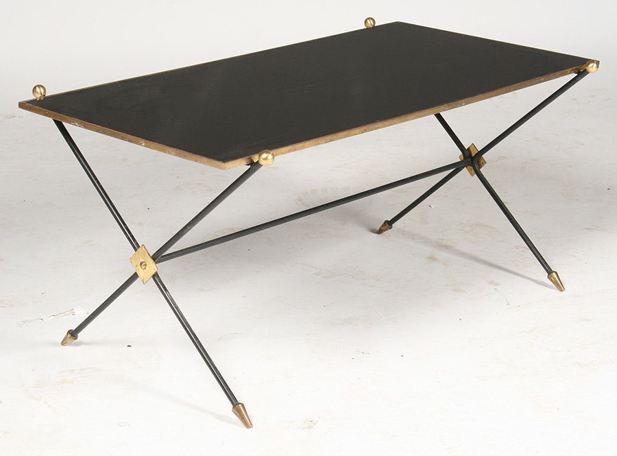 IRON COFFEE TABLE BRASS TRIMMED GLASS TOP C. 1940: An iron coffee table with brass trimmed arrow form legs having inset glass top circa 1940. Ht: 16.5" Width: 34.5" Depth: 20.75"