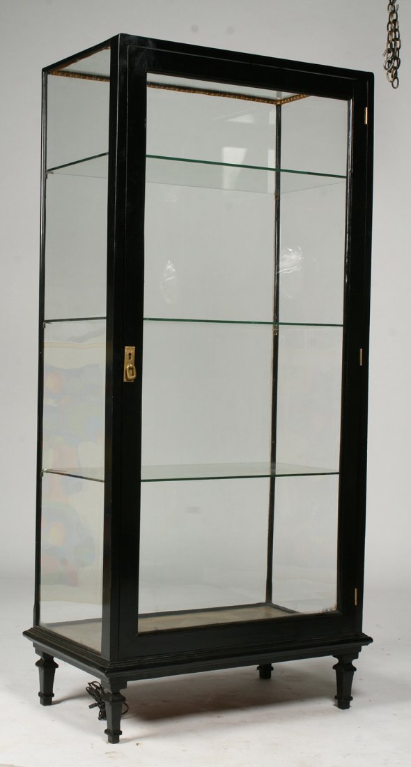 EBONIZED WOOD GLASS VITRINE PAINTED FLOOR: An ebonized wood and glass vitrine with an interesting painted floor, three glass shelves, and beveled glass on front. Also having a single door on the back. Ht: 68" Width: 33" Depth: 20"