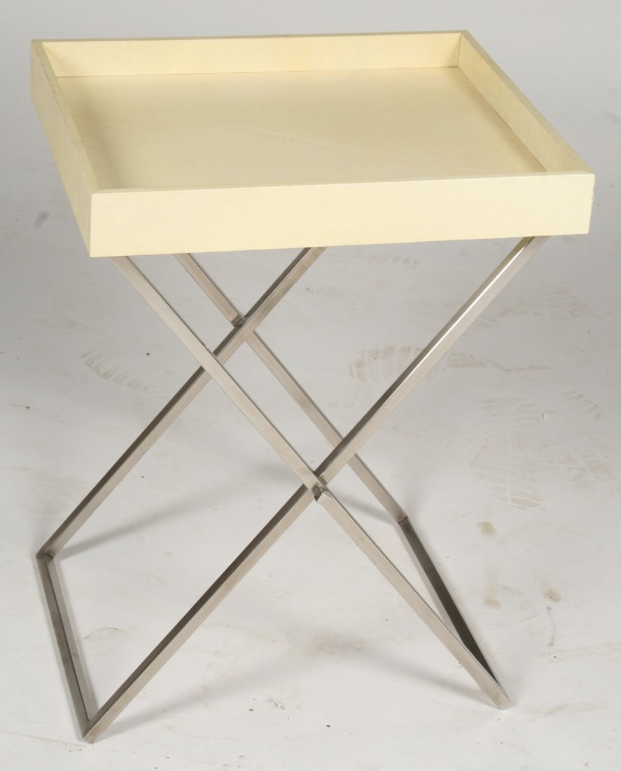 X FORM CHROME SIDE TABLE REMOVABLE PARCHMENT TOP: An x-form chrome side table having a removable parchment covered tray top. Ht: 25" Width: 19" Depth: 16"