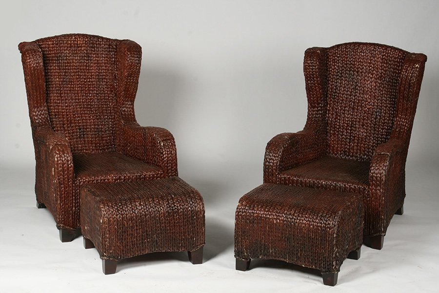 PR RALPH LAUREN WICKER WING CHAIRS WITH OTTOMANS: A pair of labeled Ralph Lauren wicker wing chairs with matching ottomans. Ht: 42" Width: 29" Depth: 32"