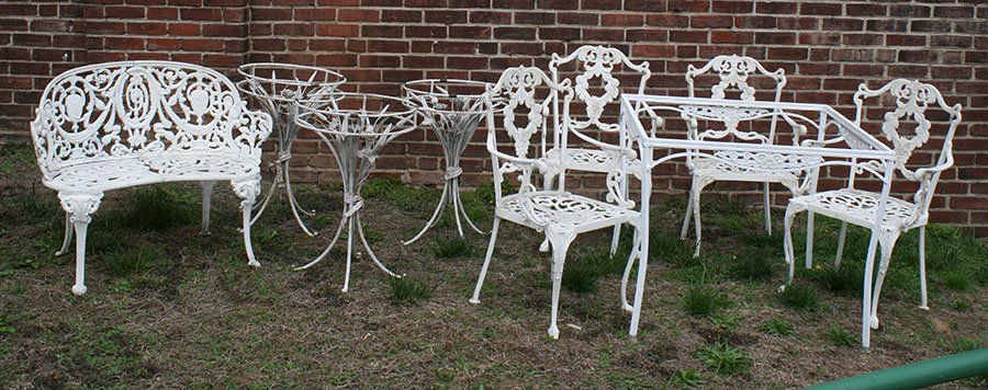 NINE PIECE GARDEN LOT ALUMINUM TABLE CHAIRS BENCH: Nine piece garden lot consisting of an aluminum table and four chairs along with three matching aluminum tables and a garden bench.