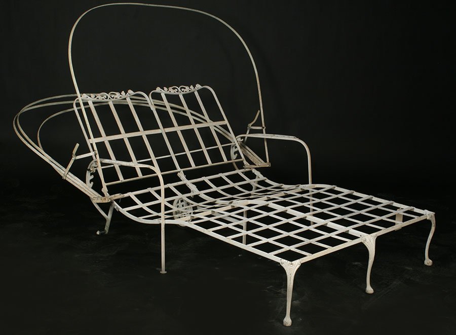 DOUBLE WIDE IRON CHAISE LOUNGE W/ CANOPY C.1950: A double wide iron chaise lounge with canopy circa 1950. Width: 49" Depth: 63"
