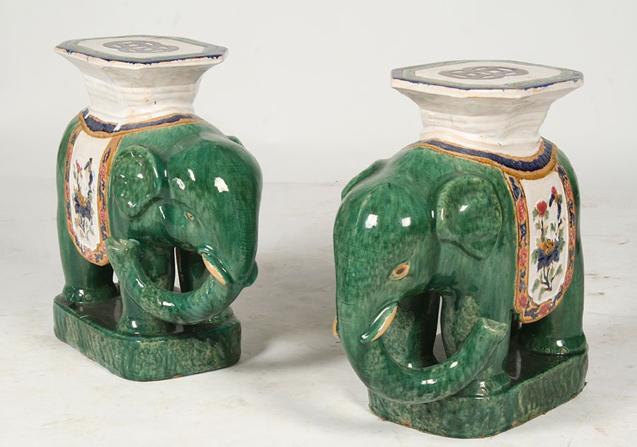 PR ASIAN GLAZED EARTHENWARE ELEPHANT STOOLS: A pair of Asian glazed earthenware elephant form garden stools. Ht: 22.5" Width: 21" Depth: 10"
