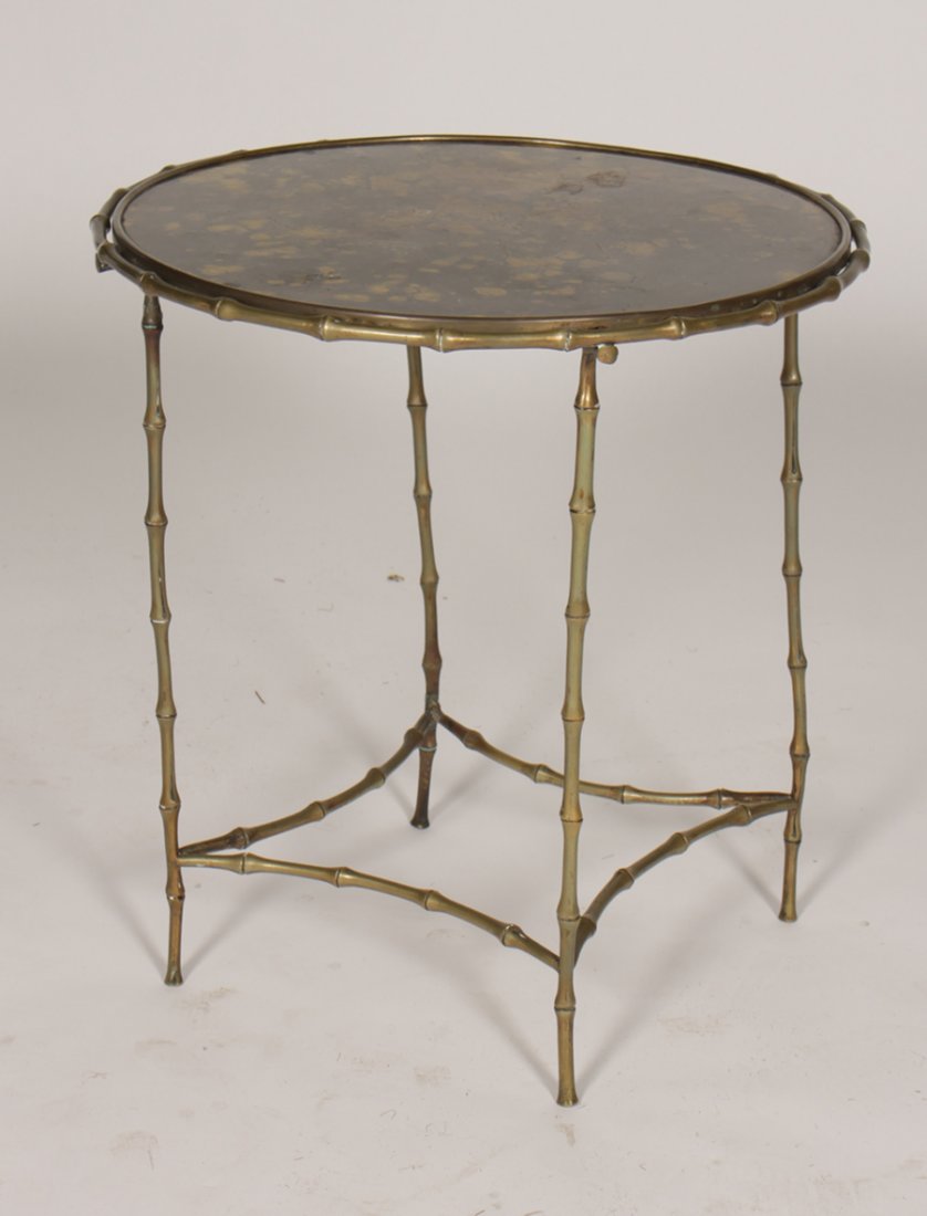JANSEN BRONZE BAMBOO OCCASIONAL TABLE CIRCA 1940: A Jansen bronze bamboo occasional table having a metal top with bronze wash circa 1940. Dimensions: Ht: 24" Dia: 22"