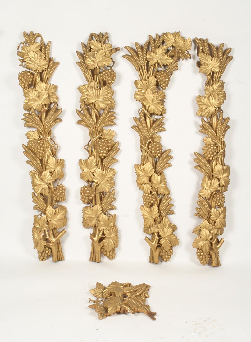 4 19TH CEN. GILTWOOD CARVED ARCH. ELEMENTS: A lot of four late nineteenth century giltwood carved architectural elements, each having grape bundle, leaf and wheat decoration. Ht: 36" Width: 10"