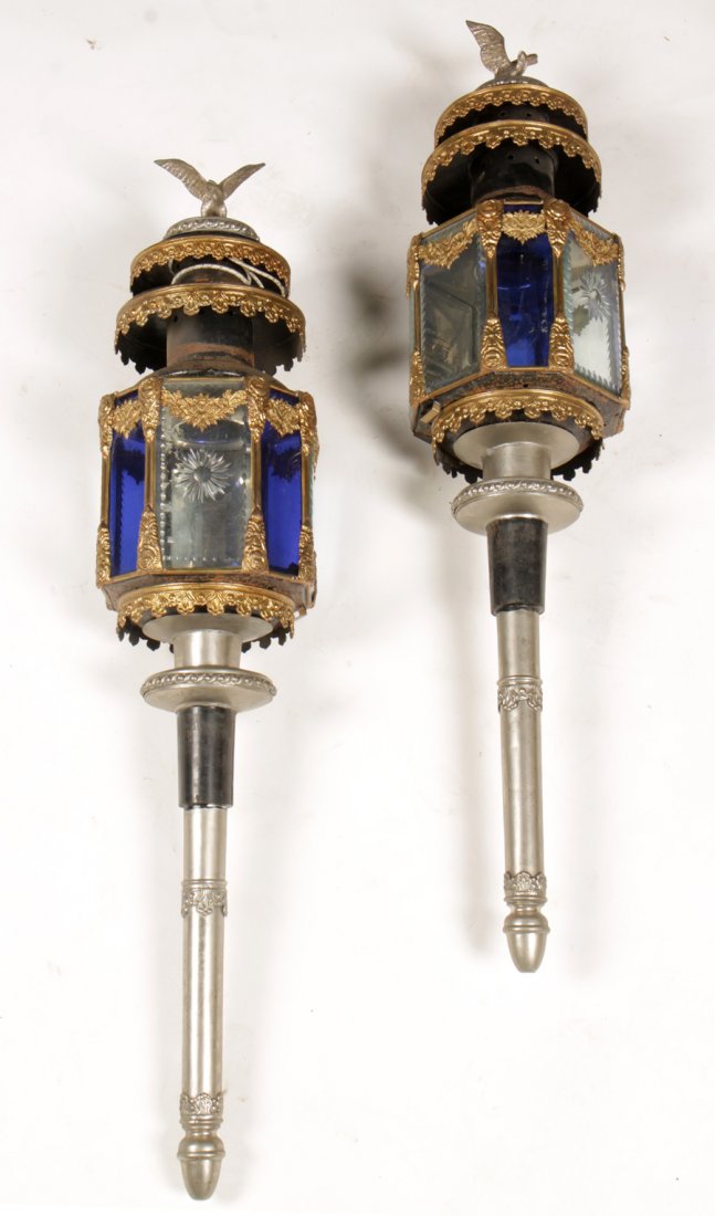 PR. 19TH C. VICTORIAN CARRIAGE COACH LANTERNS: A good large pair of nineteenth century Victorian carriage/coach lanterns having bronze eagle finials. Over tole and brass trimmed octagonal bodies with etched and colored glass panels. Ht: 36" Width: