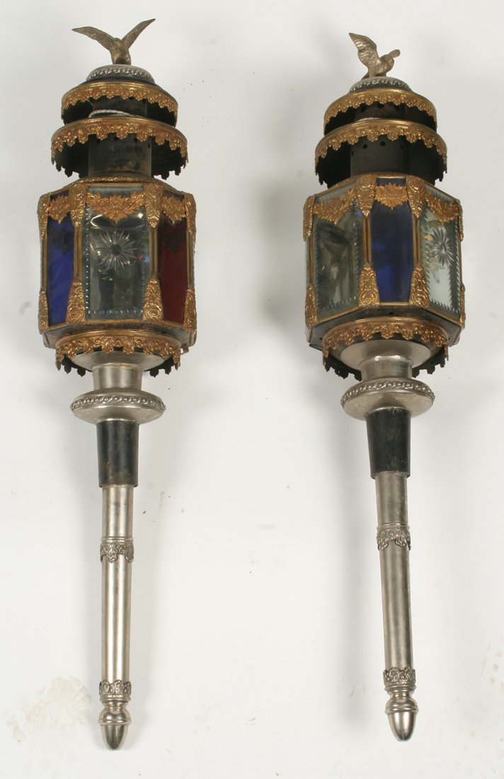 PR LATE 19TH C. GILT TOLD GLASS CARRIAGE LANTERNS: Pair of ornate late nineteenth century gilt and silvered brass, tole, and cut glass carriage lanterns. Each surrounded by a heroic eagle above concentric foliate bands, the cut glass panes alternating