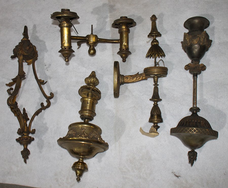 COLLECTION 5 ANTIQUE BRONZE LIGHTING ITEMS 1900: A collection of five antique bronze lighting elements circa 1900. Ht: 19" Width: 4" Depth: 8.5" (single arm sconce)