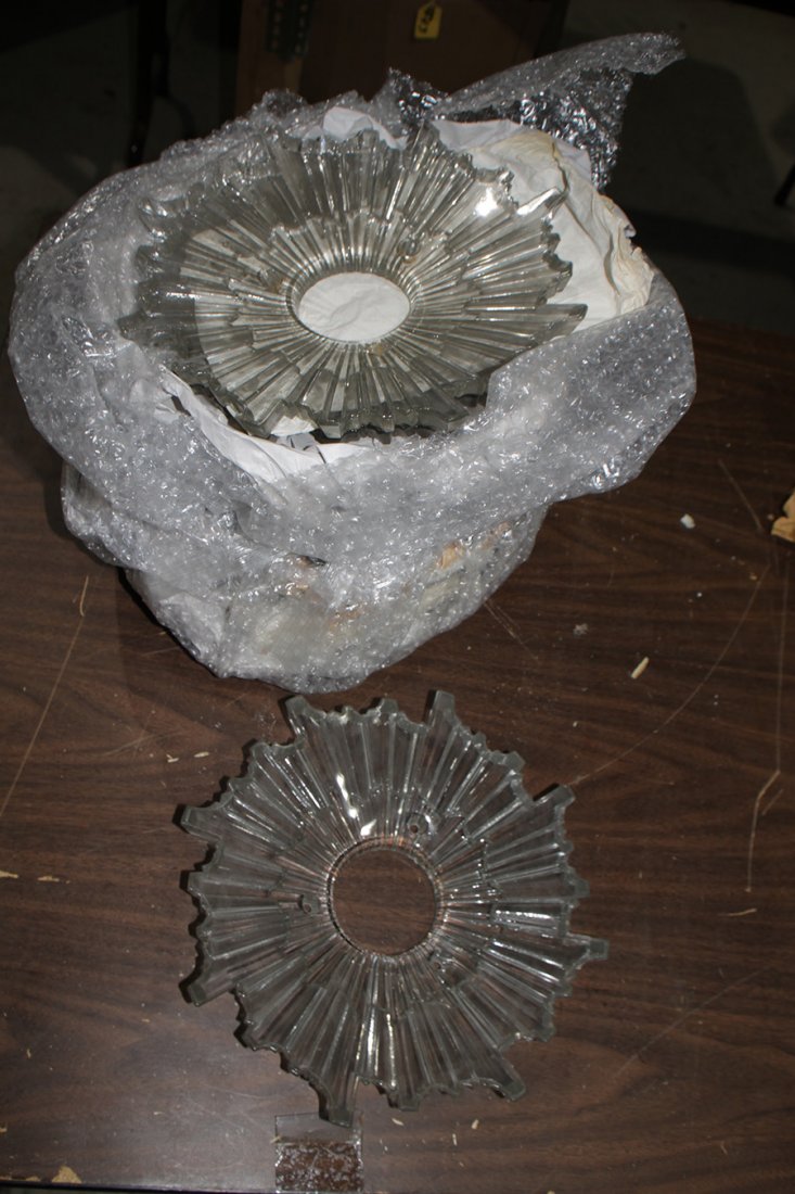 LOT OF ELEVEN GLASS SUNBURST LIGHTING ELEMENTS C. 1920: A lot of eleven glass sunburst form lighting elements circa 1920. Dia: 10"