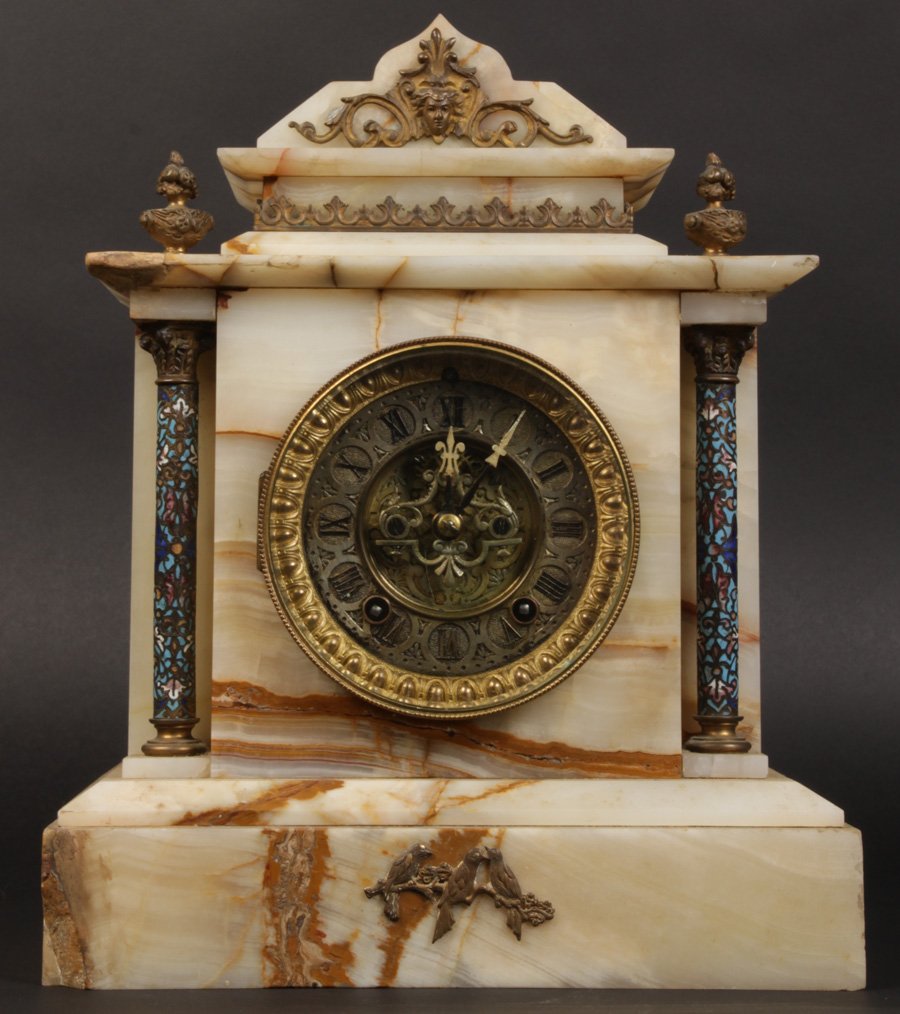 ONYX BRONZE DORE MANTLE CLOCK ORNATE DIAL 1900: An unusual onyx and bronze dore mantle clock having champleve enamel columns flanking ornately decorated dial and outer escapement circa 1900. Ht: 13" Width: 11" Depth: 5"