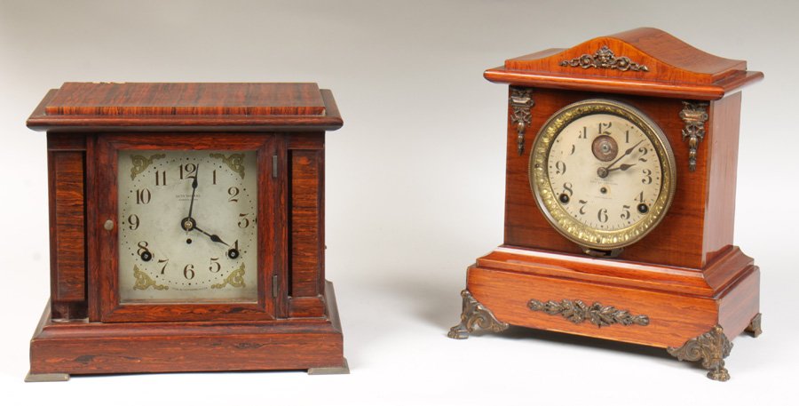 2 SETH THOMAS MANTLE CLOCKS SONORA 1900: A lot of two Seth Thomas mantle clocks circa 1900. Including a Sonora chime clock and an automatic eight day long alarm. Both clocks feature Seth Thomas' proprietary Adamantine finish. Ht: 12" Width: 