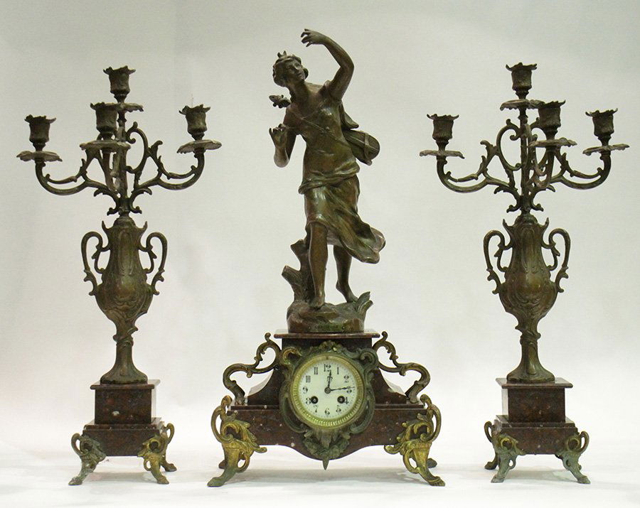 3 PC RED MARBLE GARNITURE SET SIGNED TITLED 1890: A three piece red marble and polychromed metal garniture set signed 'J. Cherrier' and titled 'Gracieuse Par CH. Perron' circa 1890. Ht: 25" Width: 13" Depth: 7"