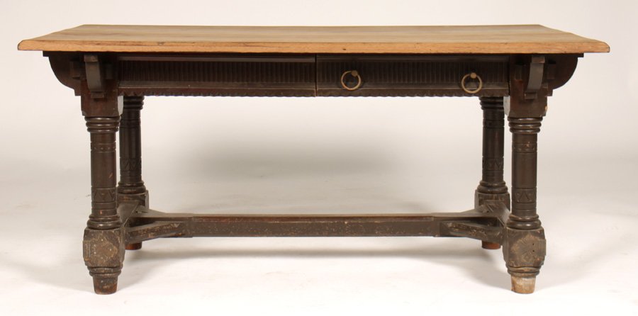 AMER. DANIEL PABST STYLE OAK LIBRARY TABLE 1880: American walnut modern Gothic style library table in the manner of Daniel Pabst circa 1870. Supported on incised and turned legs. Ht: 28" Width: 60" Depth: 33"