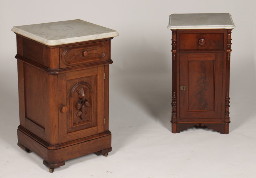 2 AMER. VIC. MARBLE TOP NIGHTSTANDS 1870: Two American Victorian marble top nightstands circa 1870. One being mahogany and crotch mahogany and finished on all four sides. The other being walnut with carved fruit on the door. Ht: 29.5" Width: 
