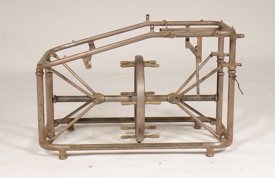 ADJUSTABLE IRON MECHANICAL TABLE 1890: Adjustable iron mechanical table having hand crank wheel, raised on rectangular bottom circa 1890. Ht: 20" Width: 19.5" Depth: 62"