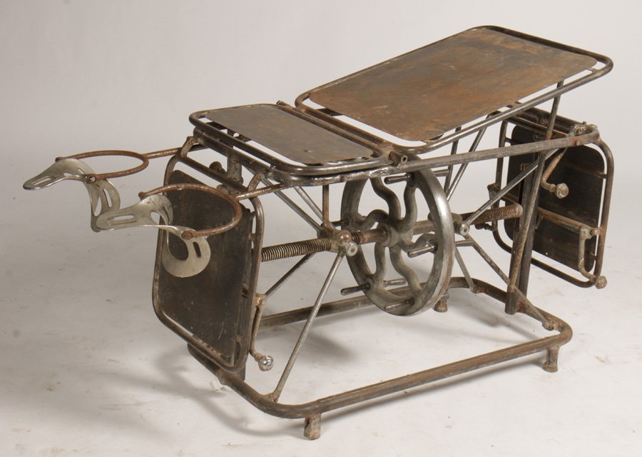 IRON CHROME PLATED MECHANICAL MEDICAL TABLE 1910: An iron and chrome plated mechanical medical table circa 1910. Width: 80" Depth: 21"