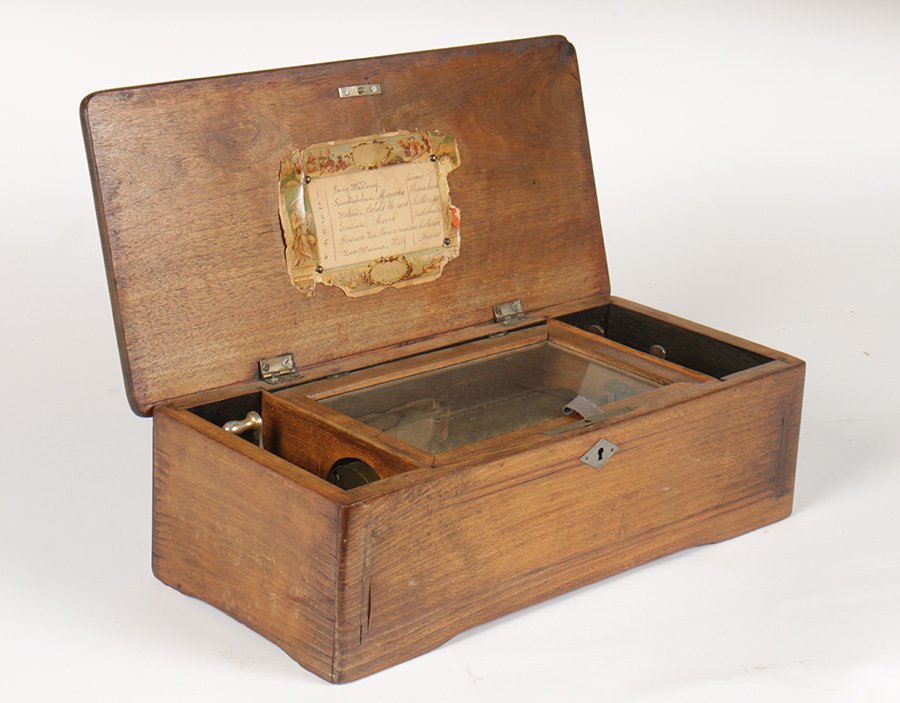 19TH C. MAHOGANY SWISS MUSIC BOX 6 AIRS C. 1880: A nice late nineteenth century Swiss music box retaining its original list of six airs all in painted and inlaid mahogany case circa 1880. Ht: 5" Width: 15" Depth: 7"