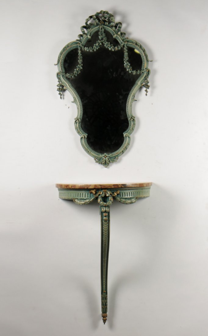 PAINTED GILT 2 PC LOT MIRROR CONSOLE: A painted and gilt two piece lot of Louis XV style furniture including a mirror and demilune console table with marble top. Mirror measures: 36" x 22" Ht: 31" Width: 22"(console)