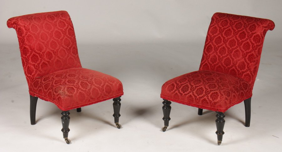 PR FRENCH NAP III UPHOLSTERED SLIPPER CHAIRS 1880: A pair of French Napoleon III upholstered slipper chairs raised on turned legs circa 1880. Ht: 28" Width: 19" Depth: 24"
