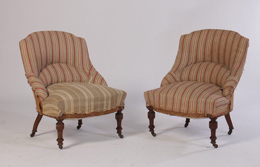 PR FRENCH NAP III SLIPPER CHAIRS 1890: An interesting pair of French Napoleon III slipper chairs having stepped back and continuous sides, all raised on turned legs circa 1890. Ht: 32" Width: 24" Depth: 19"