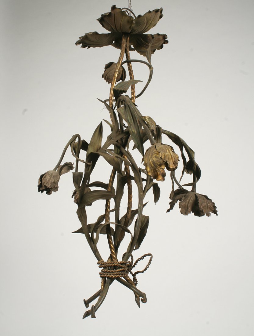 20TH C. FRENCH PAINTED TOLE FIVE LIGHT CHANDELIER: Twentieth century French painted tole and brass five light chandelier having floral boughs bound with rope. The "flowers" containing light fittings. Ht: 32" Dia: 16"